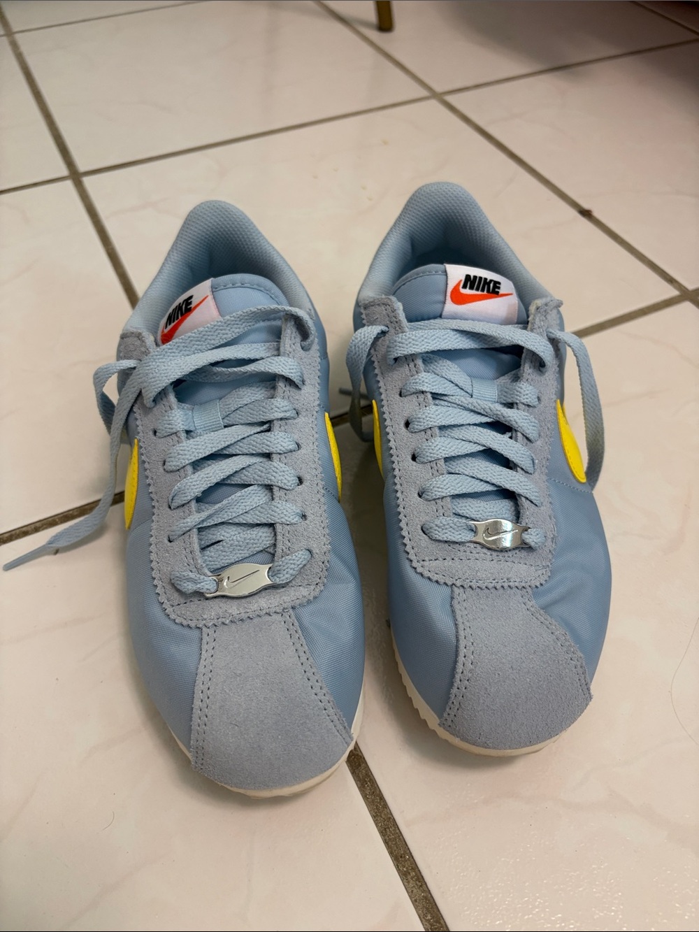 Nike Womens Cortez Baby Blue Sneakers with Yellow Swoosh